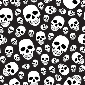 Skull seamless pattern on black background. halloween skull pattern background. vector illustration