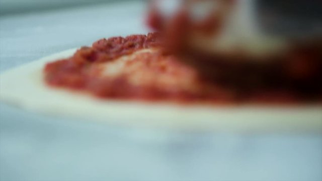 Pizza Making Process in slow motion and normal shot