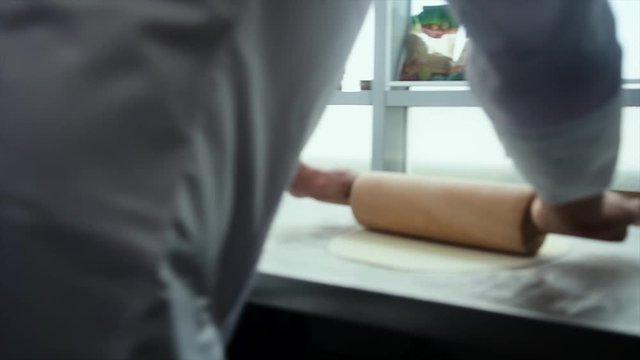 Pizza Making Process in slow motion and normal shot