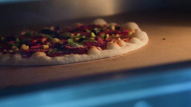 Pizza Making Process in slow motion and normal shot