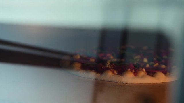 Pizza Making Process in slow motion and normal shot