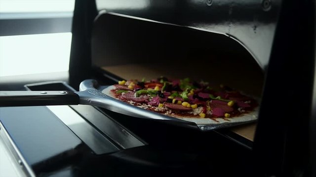 Pizza Making Process in slow motion and normal shot