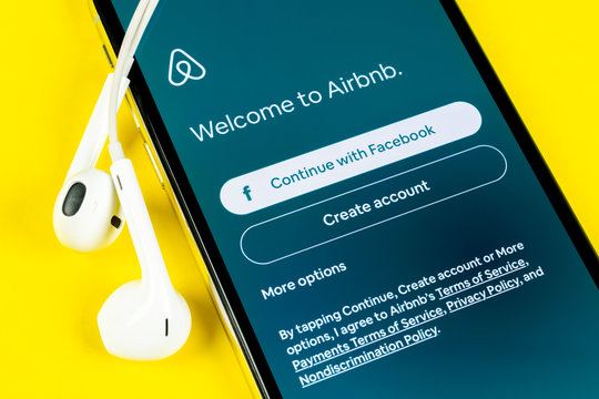 Helsinki, Finland, May 4, 2019: Airbnb application icon on Apple iPhone X screen close-up. Airbnb app icon. Airbnb.com is online website for booking rooms. social media network.