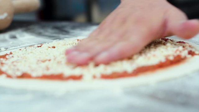 Pizza Making Process in slow motion and normal shot