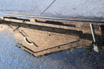 Reflection of Building in a Puddle Carriageworks Eveleigh Sydney