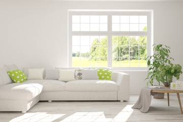 Stylish room in white color with sofa and summer landscape in window. Scandinavian interior design. 3D illustration