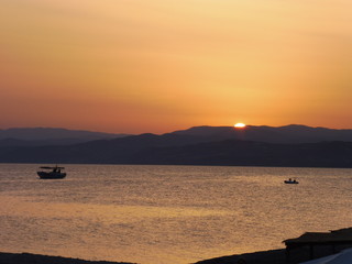 sun going down in greece