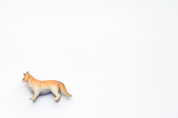 Figurine of a dog on white background