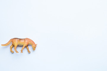 Figurine of a horse on white background