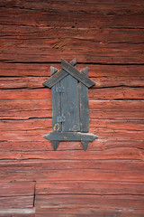 Old Swedish rural Falu red houses at the island Lovö in Stockholm a summer day