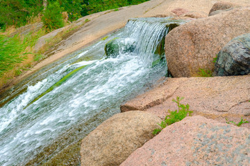 Stream threshold in the northern rocks, Sapokka landscape park, Kotka, Finland.