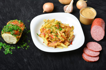 Harmful and fatty foods, spicy fried potatoes with pepper