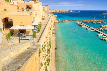 Salento coast: panorama of the port of Otranto.Italy(Apulia).View from the old town surrounded by crystal clear sea.