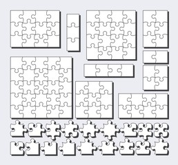 Jigsaw puzzle background with many white pieces. Abstract mosaic template