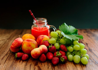 Different Fruits on Wood Textured Board.