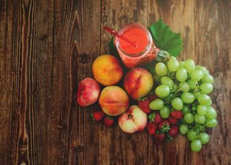 Different Fruits on Wood Textured Board.