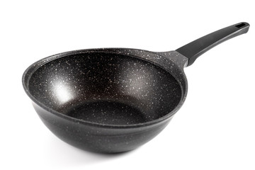 black fry pan over white background