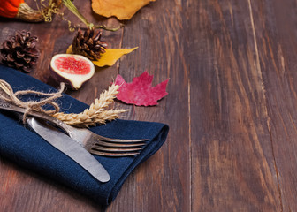 Thanksgiving day table setting on the wooden table