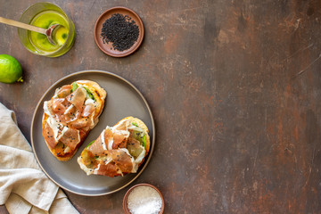 Bruschetta with prosciutto . Italian cuisine. National food.