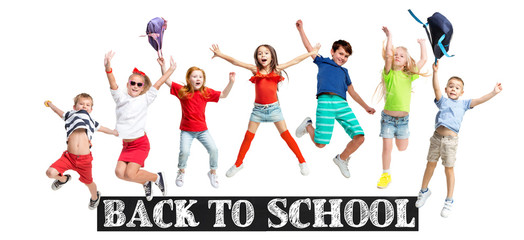 Group of elementary school kids or pupils jumping in colorful casual clothes jumping isolated on white studio background. Creative collage. Back to school, education, childhood concept.