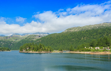 glimpses of a lake on the Alps