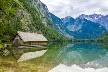 Fototapeta premium clouds over mountain lake Obersee in Germany in Alps