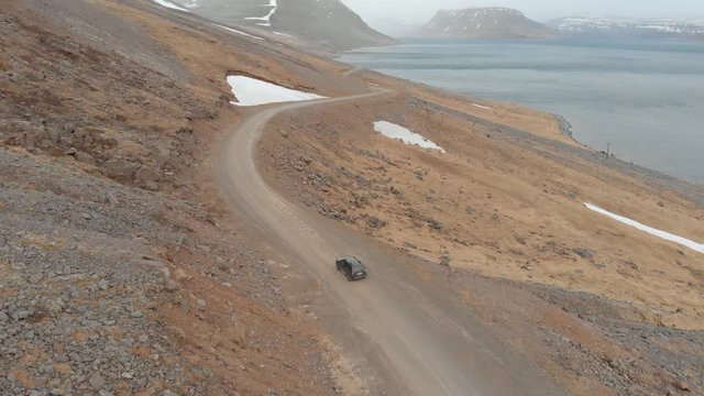Drone follows car through breathtaking scenery