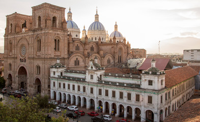 Overview of New Cathedral, showing entire street block, in Cuenca, Ecuador - obrazy, fototapety, plakaty