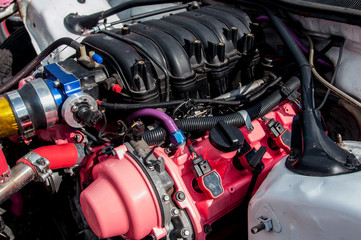 sports car engine, check the motor before the trip. under the hood. extreme sport