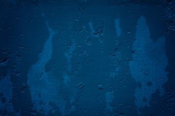 Texture of wet old dark blue concrete wall for background