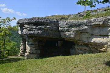 Columns and stones of Ancient Slavic cave temple of the IX century.  object of pilgrimage (Christianity)/ Monastyrok village, Borshchiv district, Ternopil region, Ukraine