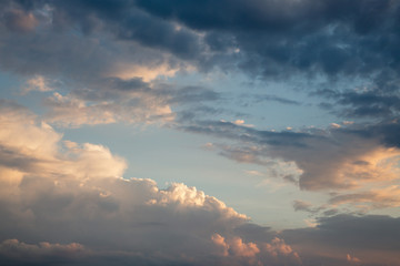 Naklejka premium Natural background with sky and clouds. Dramatic sky with clouds. Dark sky with Cumulus clouds.