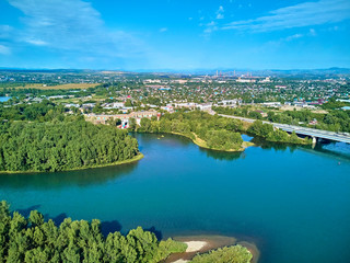 Beautiful panoramic aerial drone view to the confluence of the rivers Irtysh and Ulba in...