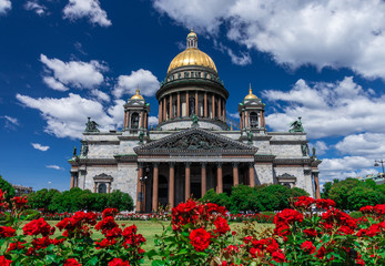 St. Isaac's Cathedral in St. Petersburg, Russia. Sunny day, blue bright sky and white clouds.
