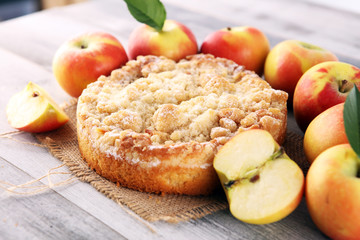 Apple pie or homemade cake with apples on wood. Delicous dessert apple tart