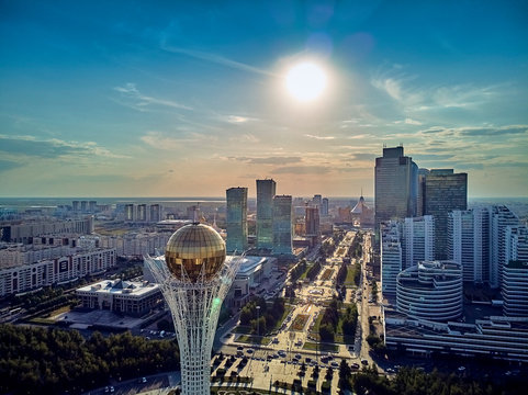 NUR-SULTAN, KAZAKHSTAN (QAZAQSTAN) - August 11, 2019: Beautiful panoramic aerial drone view to Nursultan (Astana) city center with skyscrapers and Baiterek Tower - symbol of Kazakh people freedom
