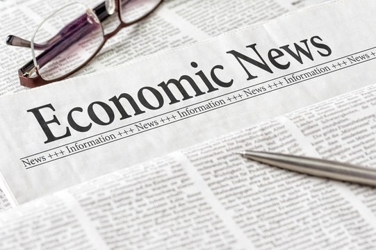 A newspaper with the headline Economic News