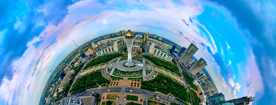 NUR-SULTAN, KAZAKHSTAN - August 11, 2019: Beautiful panoramic (360 spherical panorama little planet) aerial drone view to Nursultan (Astana) city center with skyscrapers and Baiterek Tower