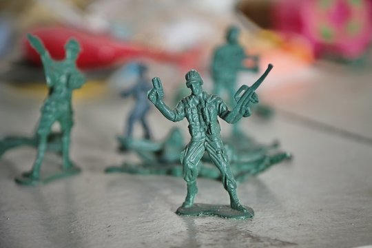 Soldier dolls, old toys on the shelves, childhood memories.