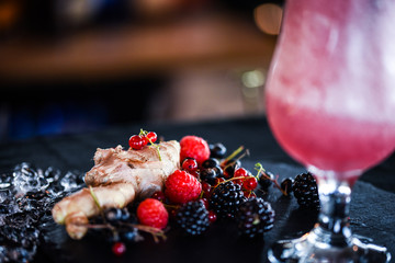 fresh forest fruit lemonade - blueberry, raspberry, blackberry with smashed ice, ginger and honey