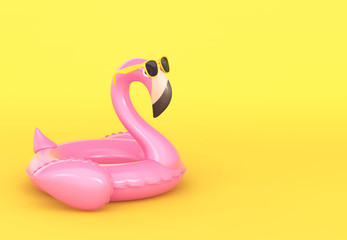 Inflatable flamingo in sunglasses on yellow background - obrazy, fototapety, plakaty