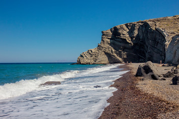 Beautiful beach of Cape Columbo also called as paradise beach in island on Santorini, Greece in...