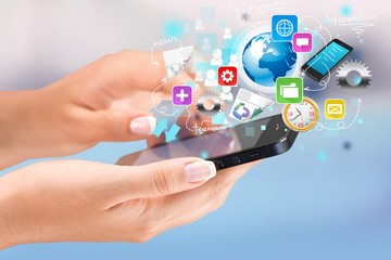 Hands holding smartphone  on background