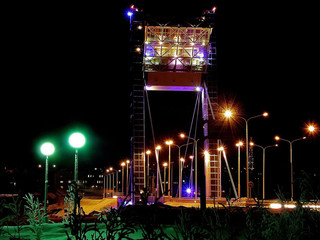 Bridge illuminated at night. The bridge in Salekhard.