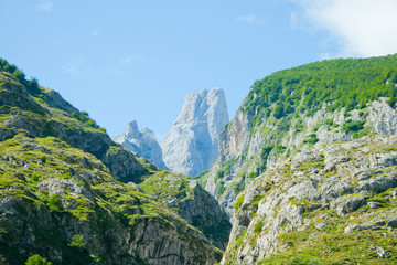 View of the emblematic Asturian mountain Naranjo de Bulnes on a sunny summer day.