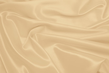 Smooth elegant golden silk or satin luxury cloth texture as wedding background. Luxurious background design. In Sepia toned. Retro style