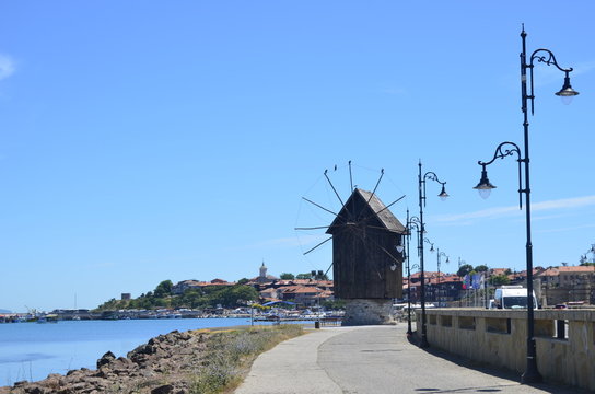  mill, lanterns and the Black Sea , Nesabar, Bulgaria, 06/13/2017.   