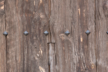 Wooden texture with metal rivets