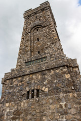 Shipka Monument or Liberty Memorial on Stoletov Peak, Balkan Mountains, Bulgaria, low-angle partial view against overcast sky