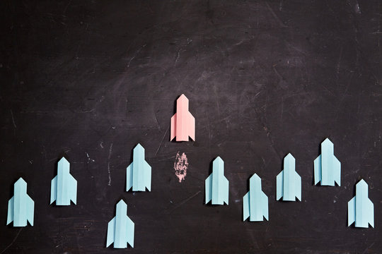 Business idea, individuality and creativity. Success and motivation. Leader breaks out of the group